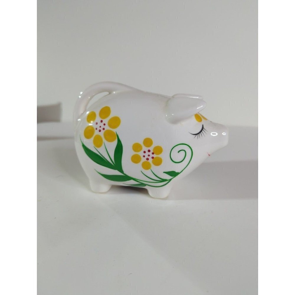 Vintage ceramic pig piggy bank with yellow painted floral design